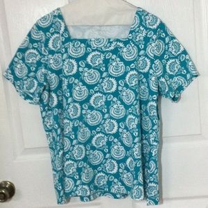 Kim Rogers teal colored t-shirt/ blouse